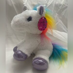 Aurora Sparkle Tales Rainbow Unicorn stuffed animal plush.
